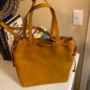 Madewell mustard yellow tote bag with strap. Slightly worn.